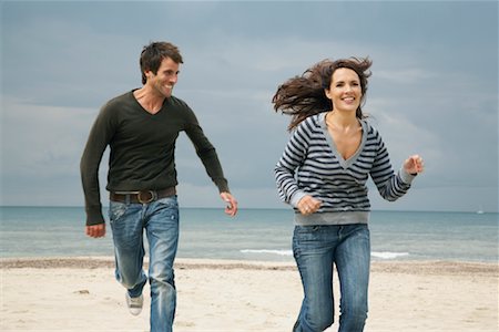 simsearch:700-01042708,k - couple Running on Beach Stock Photo - Rights-Managed, Code: 700-01082864