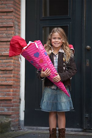 steps and front door - Girl Standing in Front of School Holding Wrapped Gift Stock Photo - Rights-Managed, Code: 700-01119761