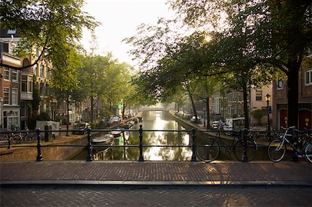 simsearch:700-01196029,k - Canal at Sunrise, Amsterdam, Netherlands Stock Photo - Rights-Managed, Code: 700-01110217