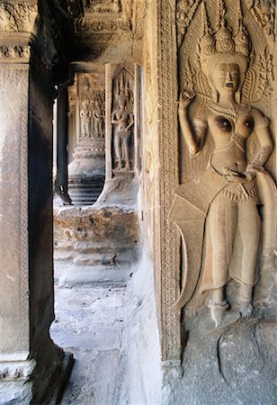 Carving of Apsaras in Temple, Angkor Wat, Phnom Penh, Cambodia Stock Photo - Rights-Managed, Code: 700-01112202
