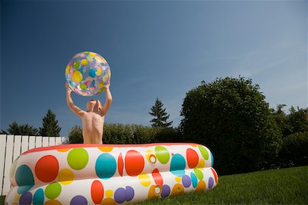 Little Boy Playing in Pool Stock Photo - Rights-Managed, Code: 700-01124284