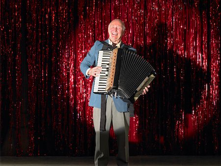 stage play curtain - Man Playing Accordion on Stage Stock Photo - Rights-Managed, Code: 700-01120508