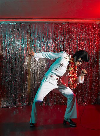 retro stand up microphone - Elvis Impersonator on Stage Stock Photo - Rights-Managed, Code: 700-01120574