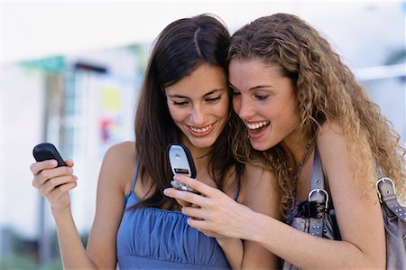 simsearch:700-06553291,k - Women Using Cell Phones Stock Photo - Rights-Managed, Code: 700-01120609