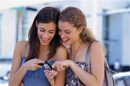 simsearch:700-06553291,k - Women Using Cell Phones Stock Photo - Rights-Managed, Code: 700-01120610