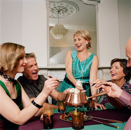 Friends at Fondue Party Stock Photo - Rights-Managed, Code: 700-01164072