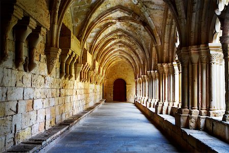 pillars arch corridor - Monastery of Santa Maria de Poblet, Spain Stock Photo - Rights-Managed, Code: 700-01164336