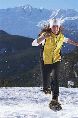 snowshoer - Woman Running with Snowshoes Stock Photo - Rights-Managed, Code: 700-01164774