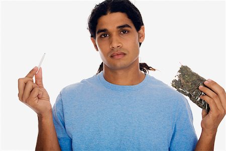 drugs (recreational) - Portrait of Man Holding Bag of Marijuana Stock Photo - Rights-Managed, Code: 700-01164960