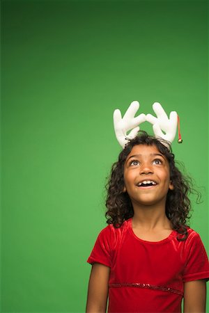 simsearch:700-00795365,k - Portrait of Girl Wearing Reindeer Antlers Stock Photo - Rights-Managed, Code: 700-01163896