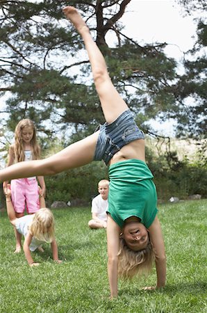 Girl Playing Outdoors Stock Photo - Rights-Managed, Code: 700-01163924