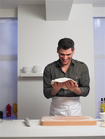 Man Making Pizza Stock Photo - Rights-Managed, Code: 700-01174094