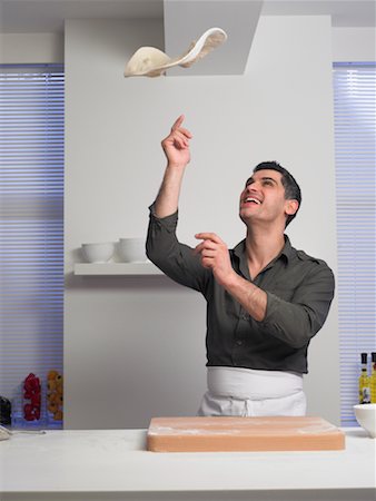 Man Making Pizza Foto de stock - Con derechos protegidos, Código: 700-01174096