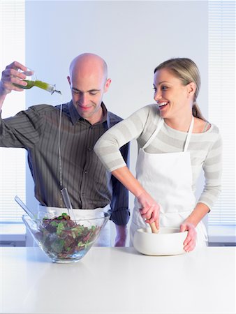 Couple Preparing Meal Stock Photo - Rights-Managed, Code: 700-01174126