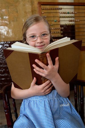 simsearch:700-00150473,k - Girl with Large Book Stock Photo - Rights-Managed, Code: 700-01173185