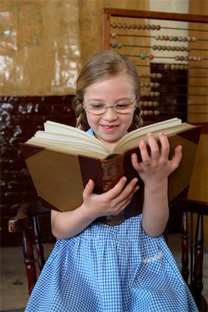 simsearch:700-00150473,k - Girl with Large Book Stock Photo - Rights-Managed, Code: 700-01173186