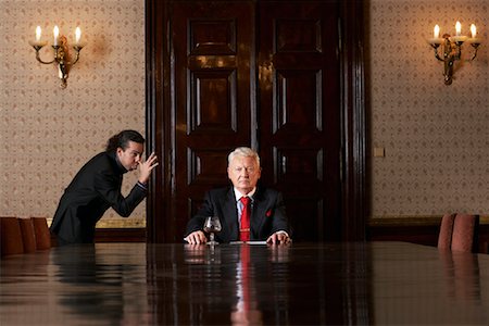 Employee Making Faces at Boss in Boardroom Foto de stock - Con derechos protegidos, Código: 700-01184966