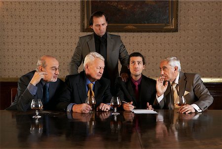 simsearch:700-00168076,k - Businessmen in Boardroom Stock Photo - Rights-Managed, Code: 700-01184978