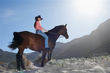 Woman Sitting on Horse Foto de stock - Con derechos protegidos, Código: 700-01185184