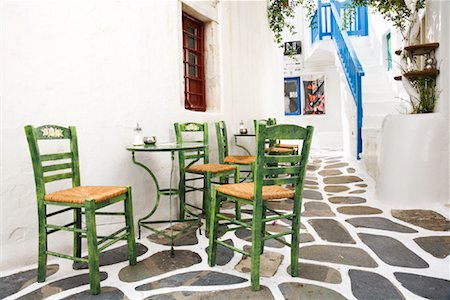 Table and Chairs, Mykonos Town, Mykonos, Greece Fotografie stock - Rights-Managed, Codice: 700-01185419