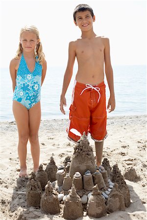 Children Building Sandcastle Stock Photo - Rights-Managed, Code: 700-01183159