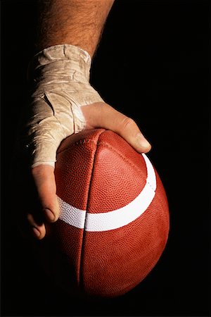 Close-up of Man Holding Football Stock Photo - Rights-Managed, Code: 700-01183646