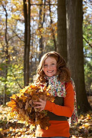 Portrait of Girl Holding Leaves Stock Photo - Rights-Managed, Code: 700-01183841