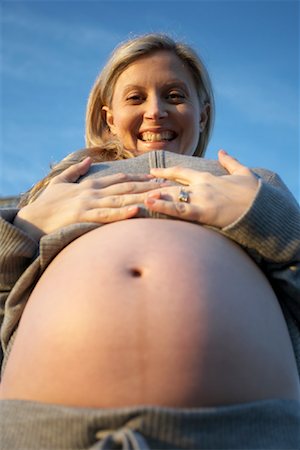 pregnant belly button - Portrait of Pregnant Woman Stock Photo - Rights-Managed, Code: 700-01194697