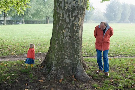 danish ethnicity - Grandfather and Granddaughter Playing Hide and Seek Stock Photo - Rights-Managed, Code: 700-01194814