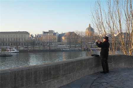 Man Taking Picture of River, Paris, France Stock Photo - Rights-Managed, Code: 700-01195000