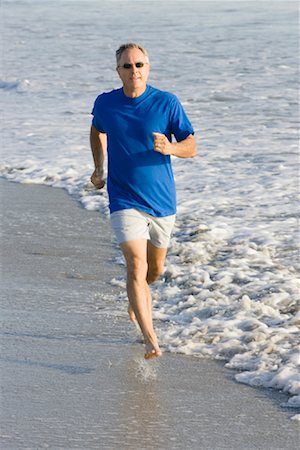 simsearch:400-04535435,k - Man Running at Beach Stock Photo - Rights-Managed, Code: 700-01196197