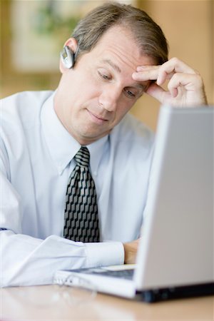 simsearch:700-00523344,k - Businessman Using Laptop Stock Photo - Rights-Managed, Code: 700-01196203