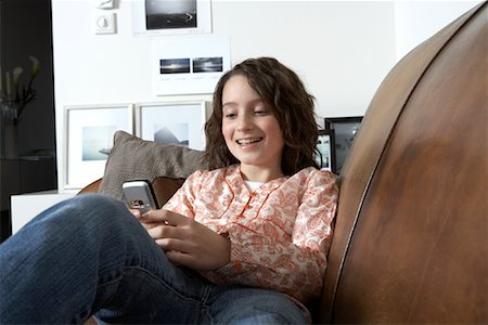 simsearch:700-01248703,k - Girl Reading Text Message Stock Photo - Rights-Managed, Code: 700-01198948
