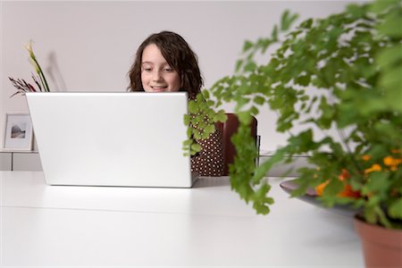 simsearch:400-05697169,k - Girl Using Laptop Computer Stock Photo - Rights-Managed, Code: 700-01198941