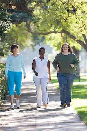 fat african american excercise - Three Women Walking Stock Photo - Rights-Managed, Code: 700-01199338