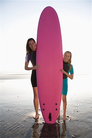 Portrait of Mother and Daughter With Surfboard Stock Photo - Rights-Managed, Code: 700-01199378