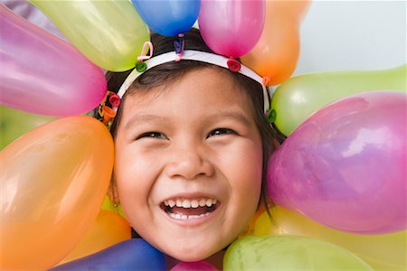 simsearch:700-01716701,k - Portrait of Girl Surrounded by Balloons Stock Photo - Rights-Managed, Code: 700-01199719