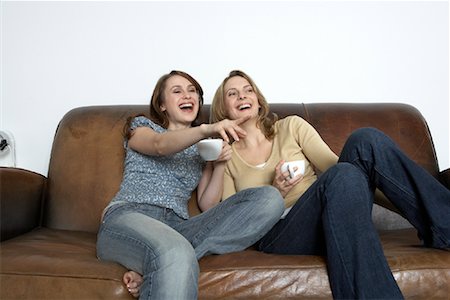 Women Sitting on Sofa Stock Photo - Rights-Managed, Code: 700-01199769