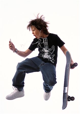 simsearch:400-04856416,k - Boy with Portable Audio Player and Skateboard Stock Photo - Rights-Managed, Code: 700-01200085