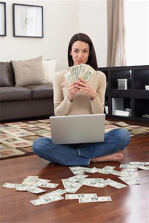 rich women with money laughing - Woman Counting Money at Home Stock Photo - Rights-Managed, Code: 700-01200171