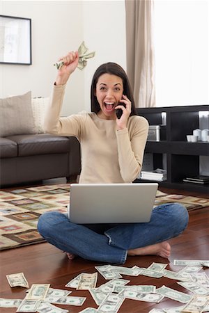 rich women with money laughing - Woman Counting Money at Home Stock Photo - Rights-Managed, Code: 700-01200173