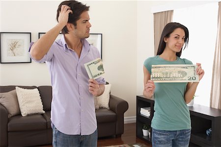 Couple Dividing Money Stock Photo - Rights-Managed, Code: 700-01200202