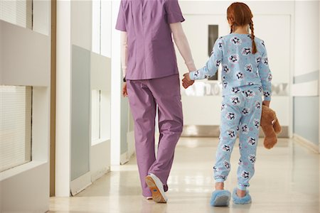 Doctor and Girl Walking in Hospital Stock Photo - Rights-Managed, Code: 700-01224091