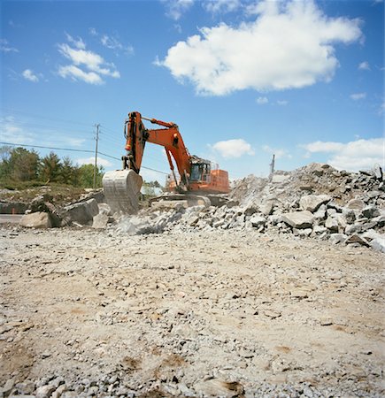 Backhoe at Construction Site Stock Photo - Rights-Managed, Code: 700-01223375