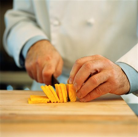 simsearch:700-00641415,k - Chef Slicing Cheese Stock Photo - Rights-Managed, Code: 700-01223370
