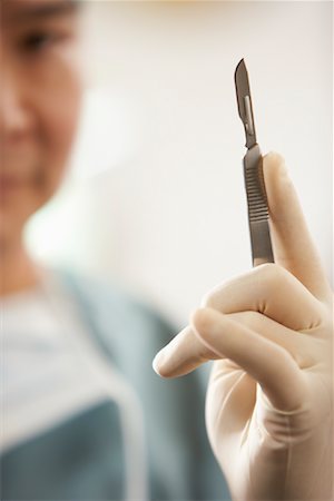 simsearch:700-01234802,k - Doctor Holding Scalpel Stock Photo - Rights-Managed, Code: 700-01234807