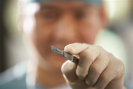 simsearch:700-01234802,k - Doctor Holding Scalpel Stock Photo - Rights-Managed, Code: 700-01234808