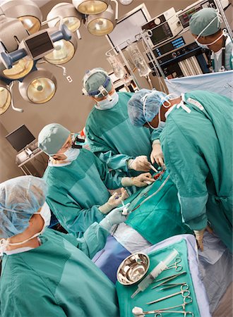 Doctors Performing Surgery Stock Photo - Rights-Managed, Code: 700-01234869