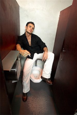 delinquent - Man in Bathroom Stall Stock Photo - Rights-Managed, Code: 700-01235965