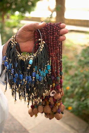 Hand Holding Necklaces Stock Photo - Rights-Managed, Code: 700-01236319